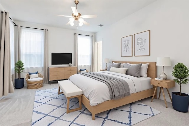 bedroom with light carpet and visible vents