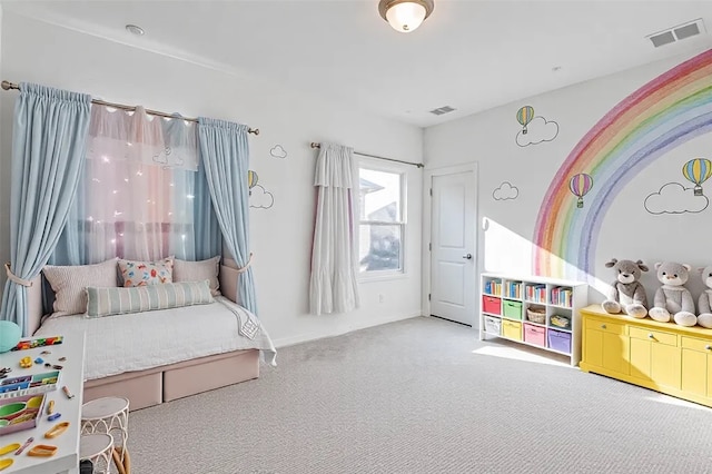bedroom with visible vents and carpet