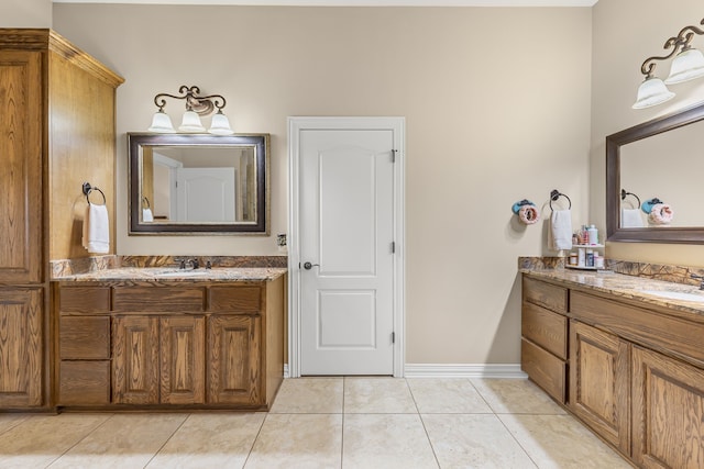 4682 County Road 2720, Caddo Mills, TX 75135 - full bathroom featuring two vanities, a sink, tile patterned flooring, and baseboards