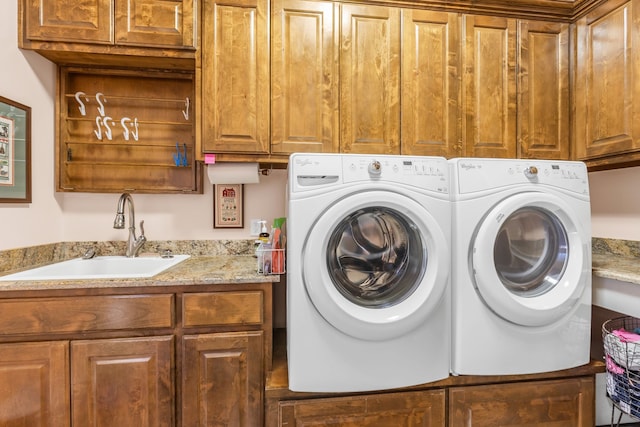 4682 County Road 2720, Caddo Mills, TX 75135 - clothes washing area featuring washing machine and dryer, a sink, and cabinet space