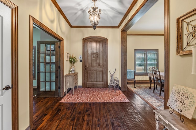 4682 County Road 2720, Caddo Mills, TX 75135 - foyer entrance with crown molding, dark wood-style flooring, and a notable chandelier