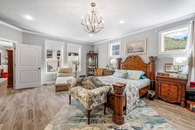 bedroom with ornamental molding, multiple windows, a chandelier, and wood tiled floor