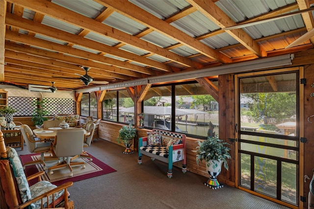 1412 Conejos Ct, Granbury, TX 76048 - sunroom / solarium with carpet floors, ceiling fan, and a water view
