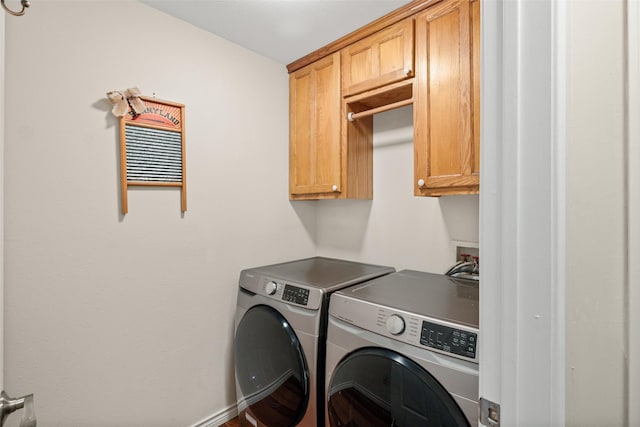 1412 Conejos Ct, Granbury, TX 76048 - laundry room with cabinet space and washer and clothes dryer