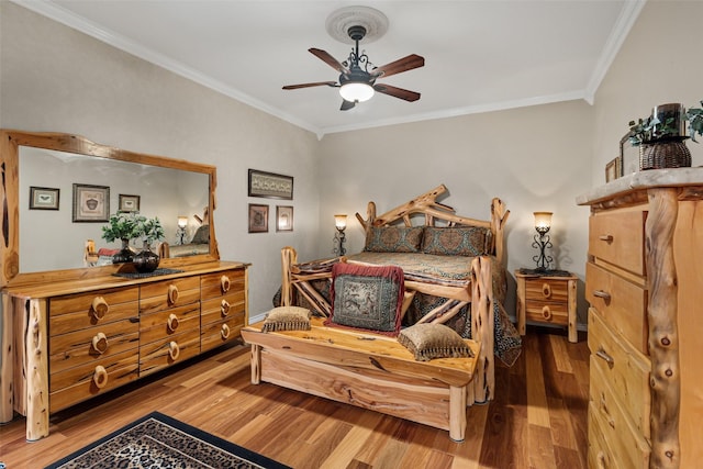 1412 Conejos Ct, Granbury, TX 76048 - bedroom featuring a ceiling fan, ornamental molding, and wood finished floors