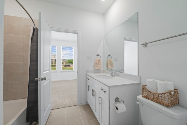 full bathroom featuring vanity, baseboards, tile patterned flooring, toilet, and shower / bathtub combination with curtain