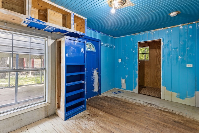 spare room with hardwood / wood-style floors