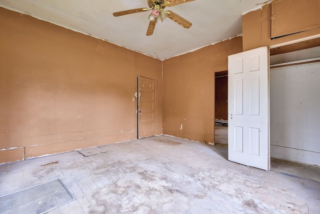 unfurnished bedroom with a closet and ceiling fan