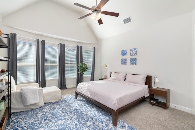 bedroom with carpet, visible vents, baseboards, high vaulted ceiling, and ceiling fan