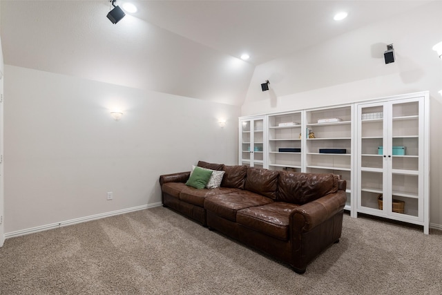 carpeted living area with recessed lighting, vaulted ceiling, and baseboards