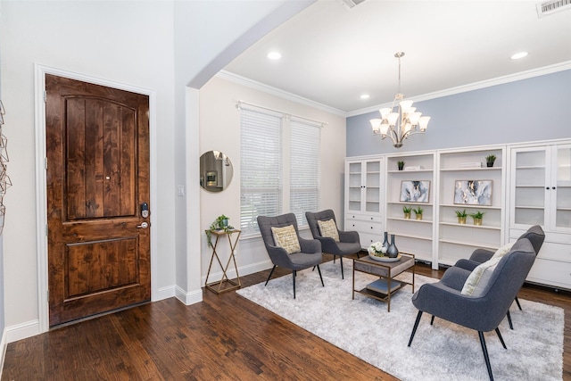 313 Grove Park Pl, Mckinney, TX 75071 - living area with dark wood finished floors, ornamental molding, a chandelier, baseboards, and arched walkways