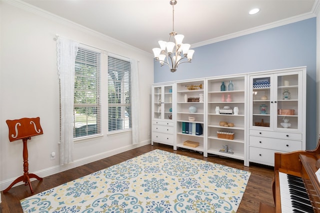 living area featuring dark wood finished floors, crown molding, baseboards, and a notable chandelier