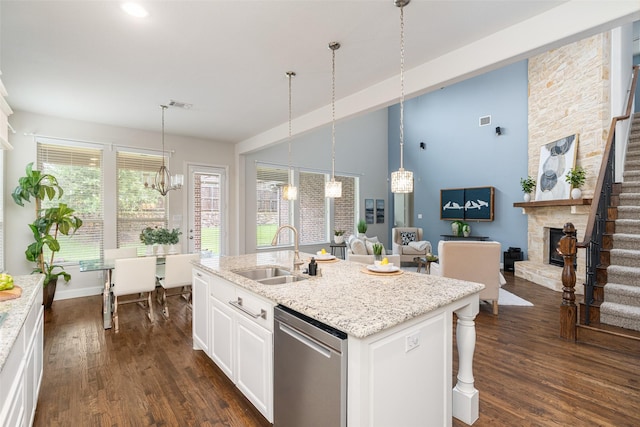 313 Grove Park Pl, Mckinney, TX 75071 - kitchen with dishwasher, a sink, a chandelier, dark wood-type flooring, and vaulted ceiling