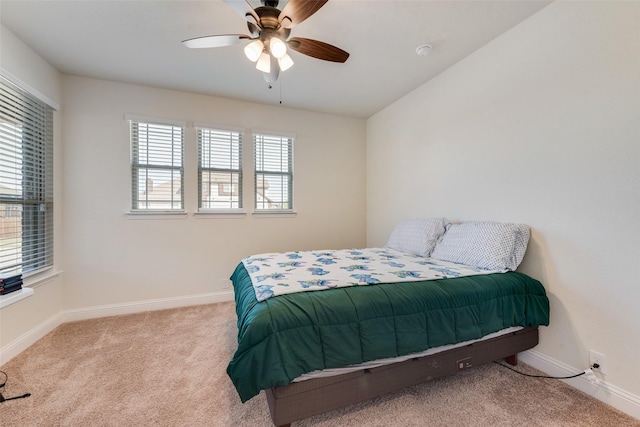 6517 Harwich Dr, Mesquite, TX 75181 - carpeted bedroom featuring baseboards and a ceiling fan
