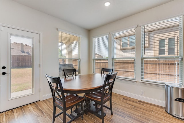 6517 Harwich Dr, Mesquite, TX 75181 - dining space featuring recessed lighting, light wood-style flooring, and baseboards