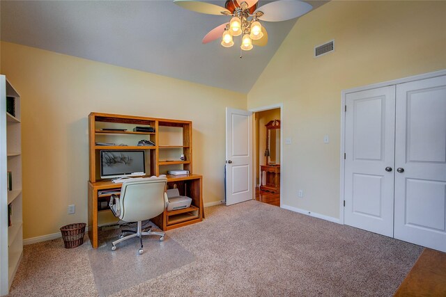 carpeted office space with high vaulted ceiling, baseboards, a ceiling fan, and visible vents