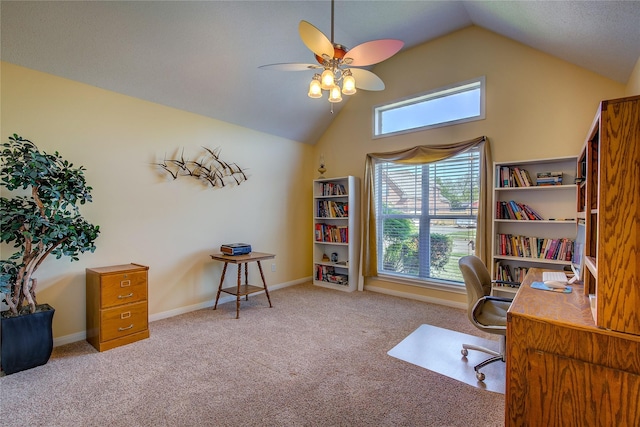 home office with carpet floors, ceiling fan, baseboards, and lofted ceiling