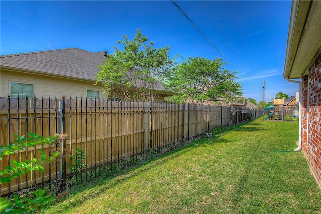 view of yard featuring a fenced backyard