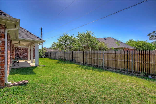 view of yard featuring a fenced backyard and a patio