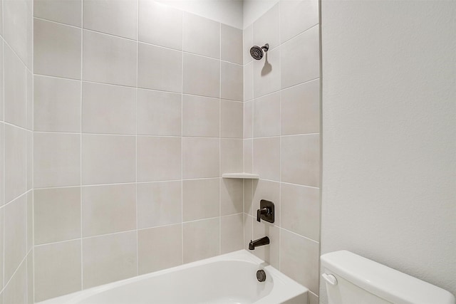bathroom with toilet and shower / bath combination
