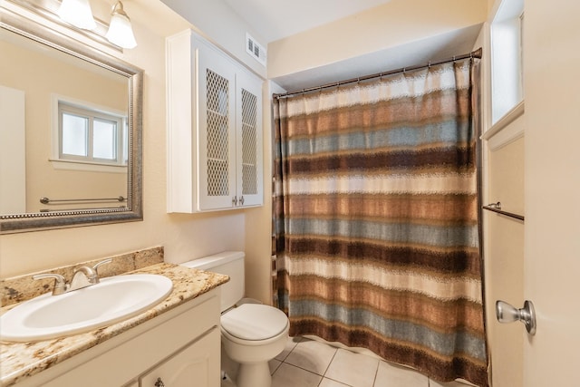 full bath featuring vanity, tile patterned flooring, a shower with curtain, toilet, and visible vents
