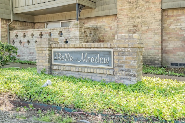 view of community sign