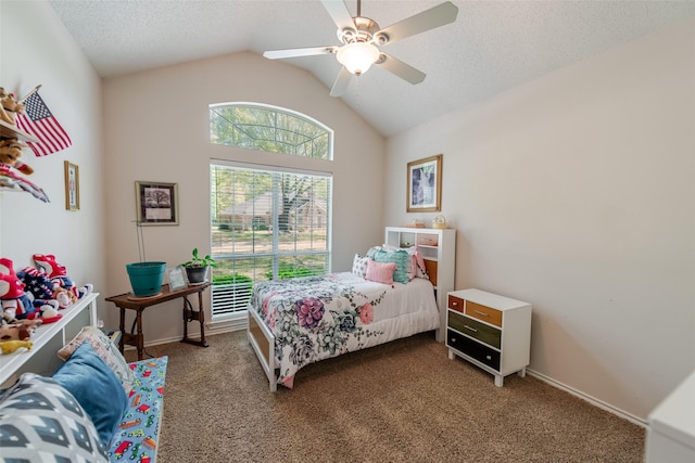 bedroom with ceiling fan, baseboards, vaulted ceiling, and carpet floors