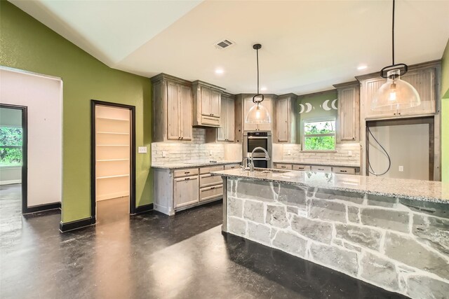 2001 Ryan Ct, Weatherford, TX 76085 - kitchen with a sink, visible vents, tasteful backsplash, and light stone counters