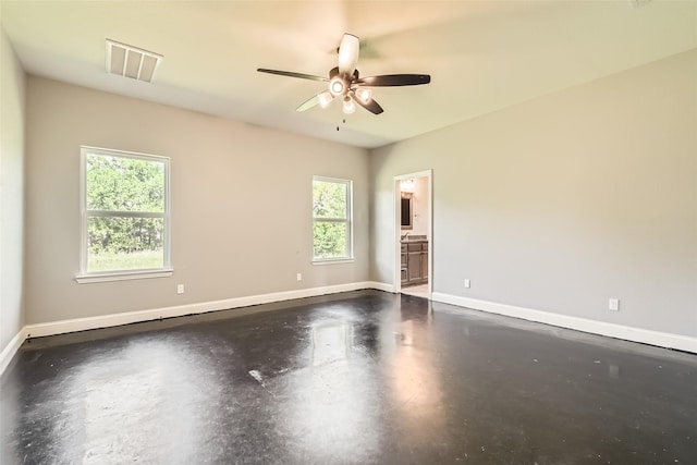 2001 Ryan Ct, Weatherford, TX 76085 - spare room featuring concrete flooring, visible vents, ceiling fan, and baseboards