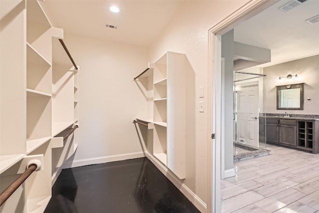 2001 Ryan Ct, Weatherford, TX 76085 - spacious closet with a sink and visible vents