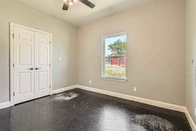2001 Ryan Ct, Weatherford, TX 76085 - unfurnished bedroom featuring a closet, baseboards, and ceiling fan