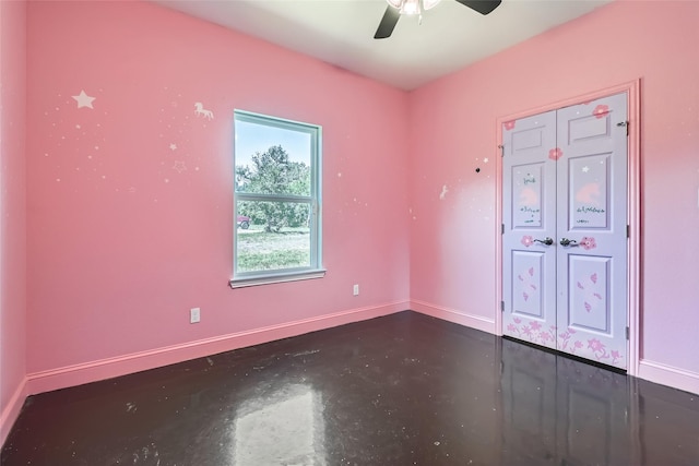 2001 Ryan Ct, Weatherford, TX 76085 - unfurnished room with concrete floors, baseboards, and a ceiling fan