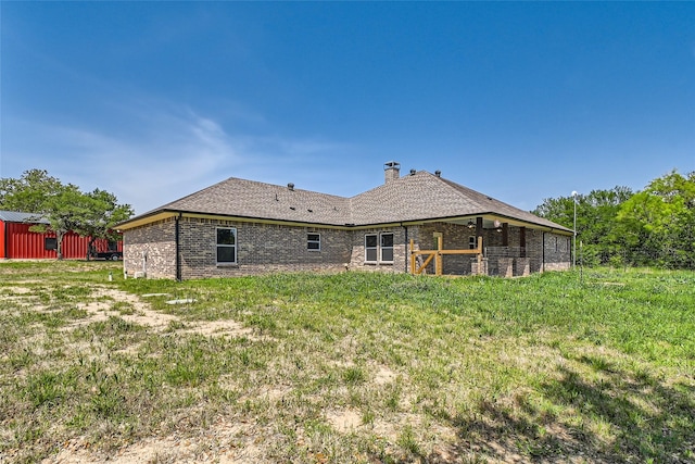 2001 Ryan Ct, Weatherford, TX 76085 - back of house with brick siding, a chimney, and a shingled roof