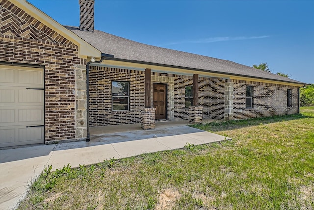 2001 Ryan Ct, Weatherford, TX 76085 - ranch-style home with brick siding, a porch, a front lawn, and a chimney