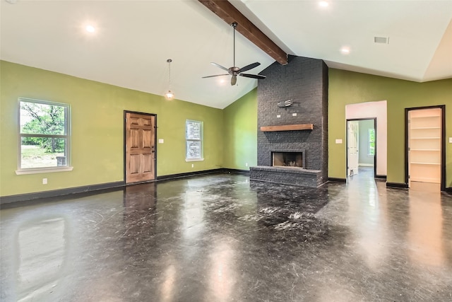 2001 Ryan Ct, Weatherford, TX 76085 - unfurnished living room featuring high vaulted ceiling, ceiling fan, beamed ceiling, a brick fireplace, and baseboards