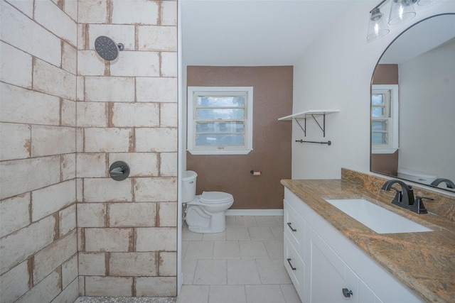 full bathroom with toilet and tiled shower