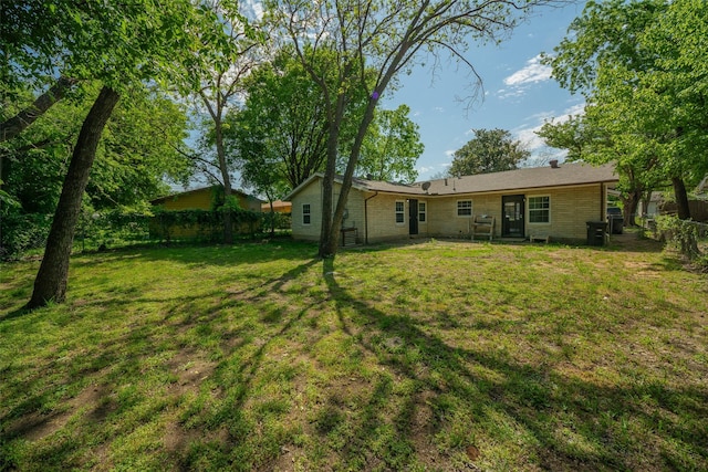 view of yard with fence
