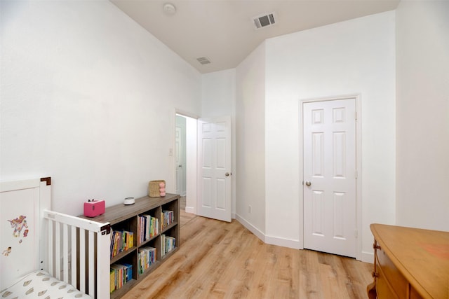 3945 Ringdove Way, Fort Worth, TX 76262 - bedroom with light wood-type flooring, baseboards, and lofted ceiling