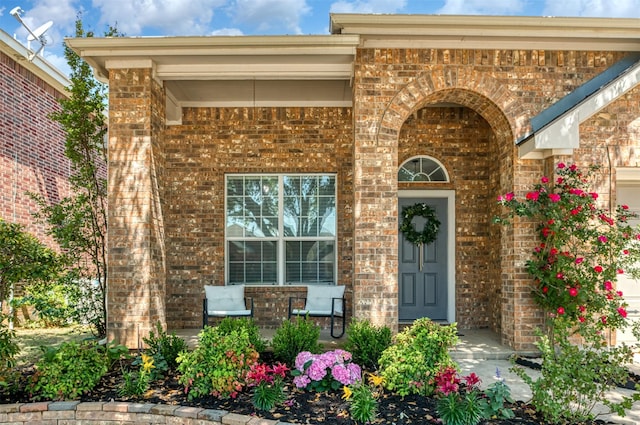 3945 Ringdove Way, Fort Worth, TX 76262 - property entrance with brick siding and a porch