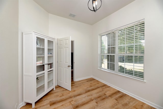 3945 Ringdove Way, Fort Worth, TX 76262 - spare room with baseboards and light wood-style floors
