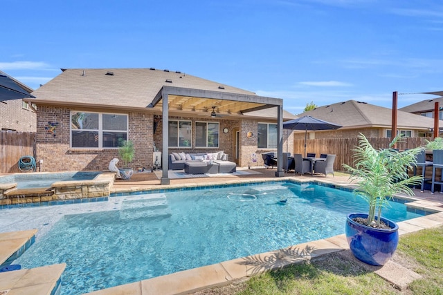 view of swimming pool with a patio area, fence, an outdoor hangout area, an in ground hot tub, and a fenced in pool