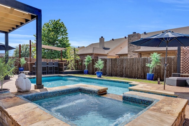 view of pool with a patio area, a fenced backyard, an in ground hot tub, and a fenced in pool