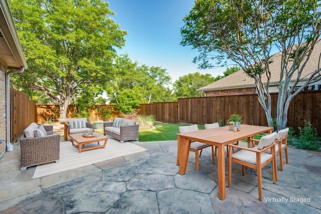 9133 Wichita Trl, Frisco, TX 75033 - view of patio / terrace featuring an outdoor living space, a fenced backyard, and outdoor dining space