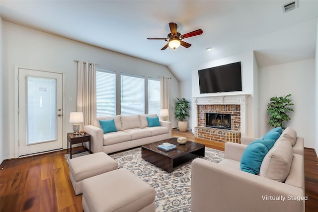 9133 Wichita Trl, Frisco, TX 75033 - living area with wood finished floors, visible vents, a ceiling fan, and vaulted ceiling
