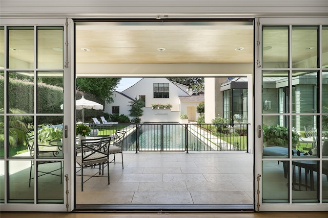 doorway featuring recessed lighting