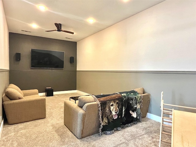 cinema featuring carpet flooring, visible vents, baseboards, and ceiling fan