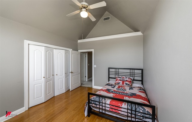 1231 Whitehall Dr, Bossier City, LA 71112 - bedroom featuring visible vents, a closet, ceiling fan, wood finished floors, and high vaulted ceiling
