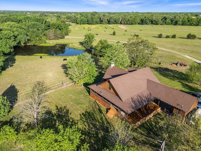 birds eye view of property featuring a rural view and a water view