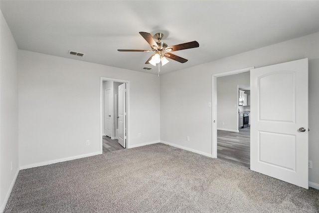 14203 Riata Ln, Dallas, TX 75253 - unfurnished room featuring ceiling fan, baseboards, carpet flooring, and visible vents