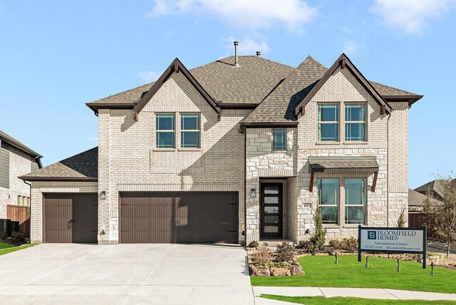 1013 Canuela Way, Fort Worth, TX 76247 - french country home featuring driveway, a shingled roof, brick siding, and a garage